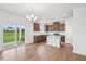 Bright kitchen with stainless steel appliances, white countertops, and shaker cabinets at 270 Chestnut Oak Ln, Lillington, NC 27546