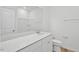 Bright bathroom with double vanity and a large mirror at 234 Chestnut Oak Ln, Lillington, NC 27546
