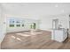 Bright and spacious living area with hardwood floors and access to backyard at 234 Chestnut Oak Ln, Lillington, NC 27546