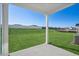 Covered patio overlooking backyard at 234 Chestnut Oak Ln, Lillington, NC 27546