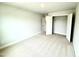 Cozy bedroom featuring neutral carpet, and access to a closet at 316 Bishop Ln, Sanford, NC 27330
