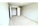 This bedroom has a built-in closet, neutral walls, and carpet at 316 Bishop Ln, Sanford, NC 27330