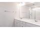 Bathroom boasts double vanity, large mirror, and a walk-in shower at 395 Fast Pitch Ln, Four Oaks, NC 27524