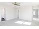 Spacious bedroom with neutral carpet, ample closet space and ensuite bathroom at 395 Fast Pitch Ln, Four Oaks, NC 27524