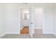 Bedroom with carpet flooring, and direct access to bathroom and closet at 395 Fast Pitch Ln, Four Oaks, NC 27524