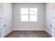 Small office with hardwood floors and French doors at 395 Fast Pitch Ln, Four Oaks, NC 27524
