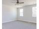 Spacious bedroom with carpet flooring and ceiling fan at 411 Fast Pitch Ln, Four Oaks, NC 27524