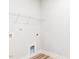 Laundry room with shelving and built-in cabinets at 411 Fast Pitch Ln, Four Oaks, NC 27524