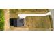 Aerial view of a home, showing a large lot and a long driveway at 427 Fast Pitch Ln, Four Oaks, NC 27524