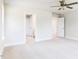 Bright bedroom with plush carpet flooring and a convenient ensuite bathroom at 427 Fast Pitch Ln, Four Oaks, NC 27524
