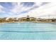 Community pool with lounge seating, a covered pavilion, and neighborhood homes at 52 Gander Dr, Benson, NC 27504