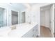 Modern bathroom with double vanity, framed mirror, and ample storage at 565 Marthas View Way, Wake Forest, NC 27587