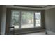 Bedroom with large windows and neutral paint, awaiting your personal touch and decor at 2909 Frances Marie Ln, Raleigh, NC 27603