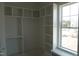 Spacious walk-in closet with ample shelving for organized storage at 2909 Frances Marie Ln, Raleigh, NC 27603