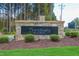 Community entrance for Sanctuary at Lake Wheeler with stone monument sign at 2909 Frances Marie Ln, Raleigh, NC 27603
