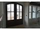 A beautiful front entry showcases a dark wood door with decorative glass panels at 2909 Frances Marie Ln, Raleigh, NC 27603