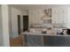 A spacious kitchen with ample cabinetry, a large island, and modern amenities at 2909 Frances Marie Ln, Raleigh, NC 27603