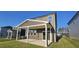 The backyard features a covered patio and a well-maintained lawn at 2728 Princess Tree Dr, Raleigh, NC 27616