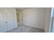 A bright bedroom features neutral walls, plush carpeting, and a double door closet at 2728 Princess Tree Dr, Raleigh, NC 27616