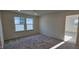 Bedroom featuring a sun-filled windows and neutral carpet at 2728 Princess Tree Dr, Raleigh, NC 27616