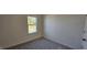 A naturally lit bedroom features neutral walls and plush carpeting at 2728 Princess Tree Dr, Raleigh, NC 27616