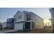 Two-story home with gray siding, red shutters, and a two car garage at 2728 Princess Tree Dr, Raleigh, NC 27616