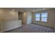Upstairs living room with neutral carpet and gray walls at 2728 Princess Tree Dr, Raleigh, NC 27616
