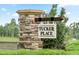 Stone pillar and sign for Tucker Place neighborhood at 2728 Princess Tree Dr, Raleigh, NC 27616