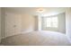 Comfortable bedroom with plush carpeting, a window, and a closet at 196 Abingdon Farms Dr, Selma, NC 27576