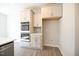 Gourmet kitchen with built-in stainless steel appliances and shaker style cabinets at 196 Abingdon Farms Dr, Selma, NC 27576