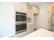 Gourmet kitchen with built-in stainless steel appliances and shaker style cabinets at 196 Abingdon Farms Dr, Selma, NC 27576