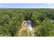 Stunning aerial view of a single Gathering home nestled amongst mature trees providing a very private setting at 242 Sequoia Dr, Louisburg, NC 27549