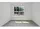 Bright and airy bedroom with plush carpet and a view of the outdoors at 242 Sequoia Dr, Louisburg, NC 27549