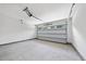 Spacious, empty garage has room for parking and storage at 242 Sequoia Dr, Louisburg, NC 27549
