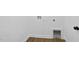 Laundry room featuring modern floors and pet door access at 242 Sequoia Dr, Louisburg, NC 27549
