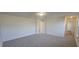 A carpeted bedroom with a neutral color palette offers a calm space at 466 Saint Clair Dr, Fuquay Varina, NC 27526