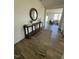 Inviting entryway showcasing a wooden console table, round mirror, and stylish runner rug at 466 Saint Clair Dr, Fuquay Varina, NC 27526