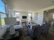 Bright living room features natural light, comfortable seating and decorative wall art at 466 Saint Clair Dr, Fuquay Varina, NC 27526