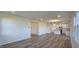Spacious living room with hardwood floors, recessed lighting, and an open layout at 466 Saint Clair Dr, Fuquay Varina, NC 27526
