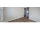Bright, airy room with wood floors and view to the outside at 466 Saint Clair Dr, Fuquay Varina, NC 27526