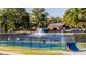 Pickleball courts, a skate ramp and pond with fountain in a park at 81 Hank Way, Angier, NC 27501