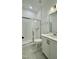 The modern bathroom has an enclosed shower and tile floors at 2048 Abbeyhill Dr # 98, Raleigh, NC 27610