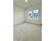 Cozy bedroom with plush carpeting and natural light at 2048 Abbeyhill Dr # 98, Raleigh, NC 27610