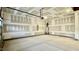 The unfinished garage has plenty of space at 2048 Abbeyhill Dr # 98, Raleigh, NC 27610