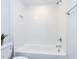 Bright, modern bathroom featuring white subway tile surround, shower, and neutral fixtures at 809 St Charles St, Durham, NC 27713