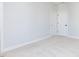 Neutral bedroom with carpet and two doors at 809 St Charles St, Durham, NC 27713