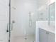 Bright, tiled shower with glass door, showcasing modern fixtures and ample space at 809 St Charles St, Durham, NC 27713