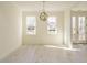Dining area featuring stylish light fixture and natural lighting at 30 Tamaran Ct, Spring Hope, NC 27882