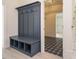 Functional entryway featuring a built-in bench and coat rack, perfect for organization at 30 Tamaran Ct, Spring Hope, NC 27882