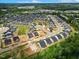Aerial view of a developing neighborhood with new homes under construction at 3102 Castlerock Dr # 2, Burlington, NC 27215